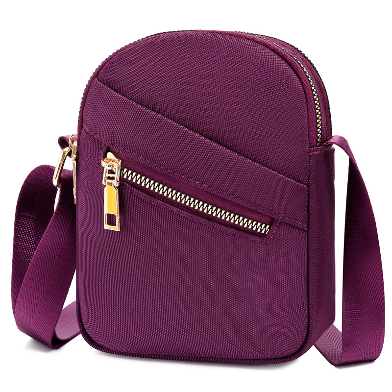 Summer nylon key cell phone bag with girl slant across the canvas.