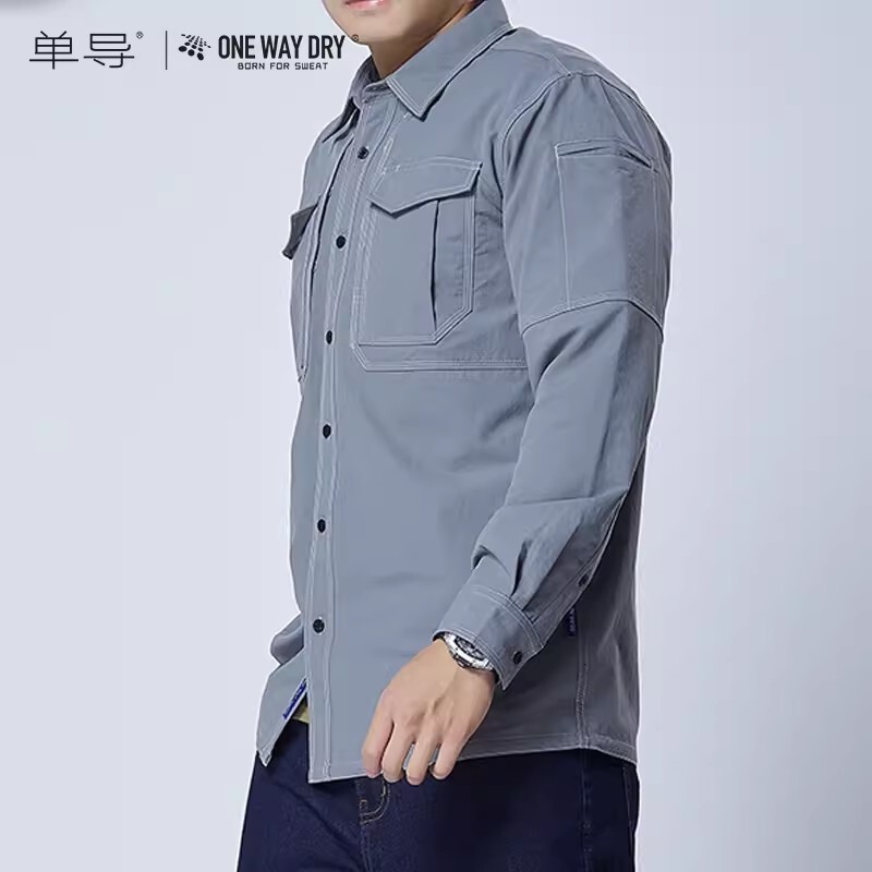 Single-guided dynamic workers with long-sleeved shirts and bags of shirts and shirts outside the autumn and winter.