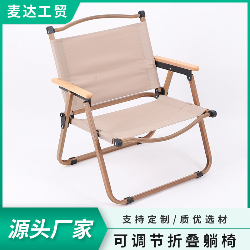 Camping outside a folding chair with a folding of a kmitt chair and a beach chair.