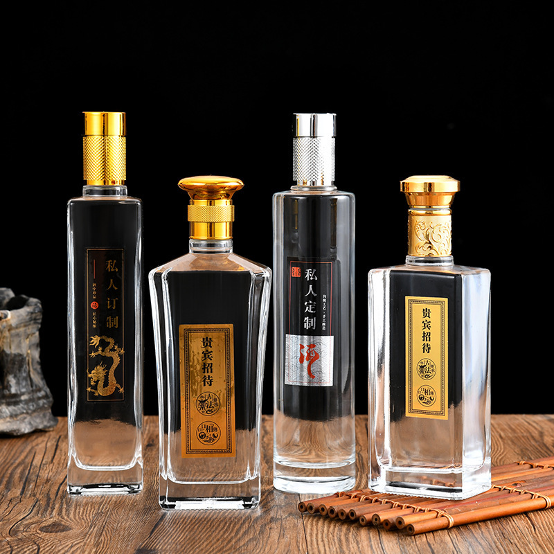 A new white bottle of 500 milligrams of white glass with an empty bottle of high-quality, transparent and self-made wine.