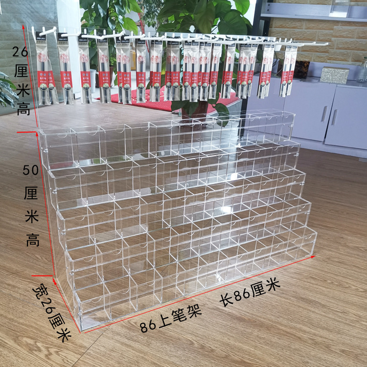 Cái giá viết cho cửa hàng văn phòng, chiếc Acre với lõi bút, kệ trưng bày màn hình đa mục đích.