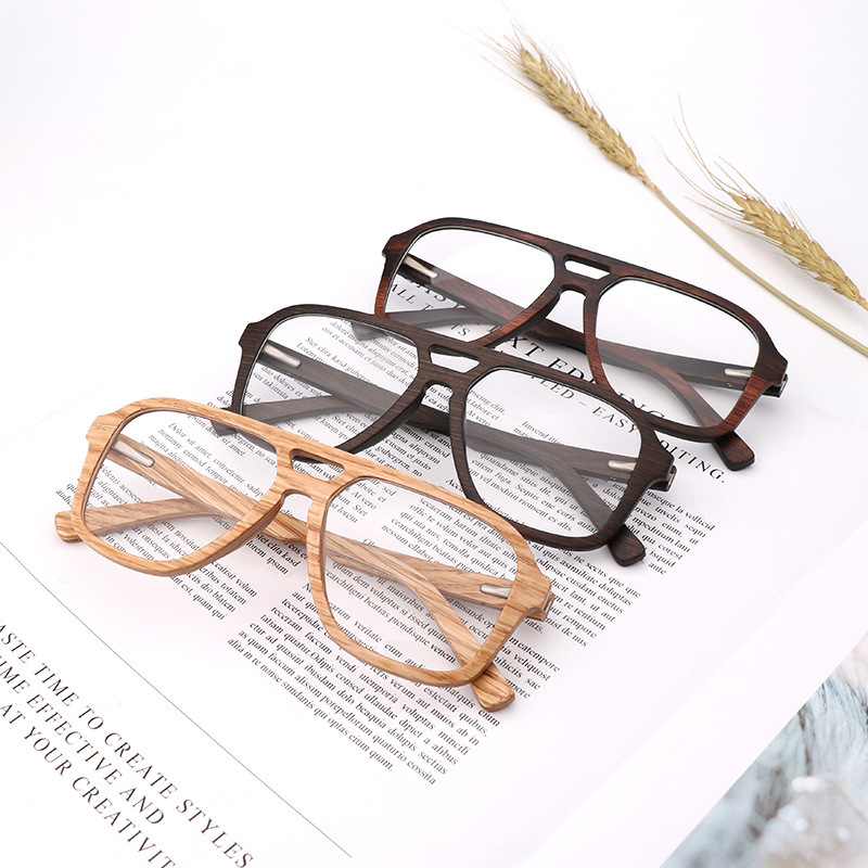 The new cross-border pair of bamboo glasses, the fashion frame elliptical shape, the outdoor cycling of light mirrors, the spot.