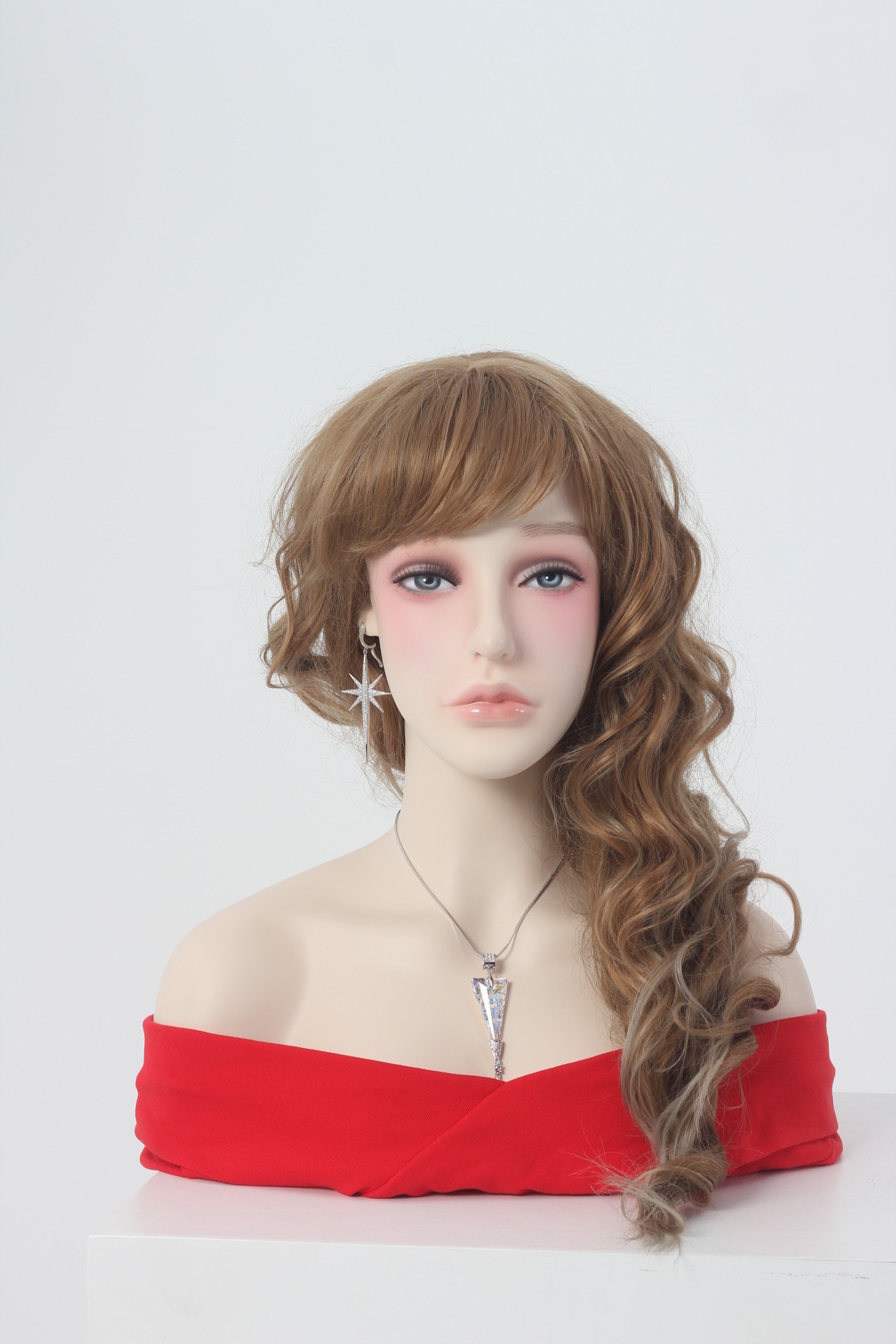 Model heads, window-dressed women's wigs, costumes for male and female models.