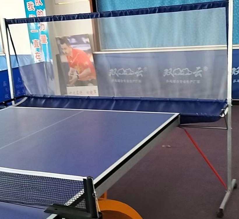 The ping-pong network moves the global net to the ground and the tennis machine receives the net.