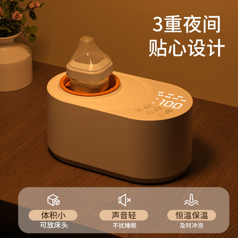 Máy lắc sữa gấu lớn là hai rưỡi máy tự động hòa bột nóng để giữ ấm đứa bé.
