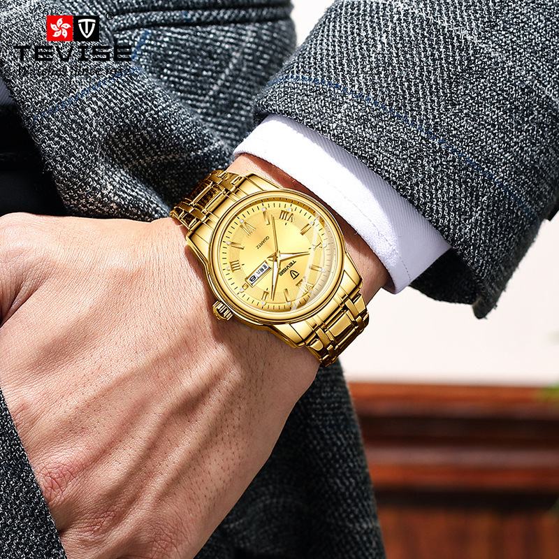 A man's double calendar watch with a shivering boom watch in his hair.