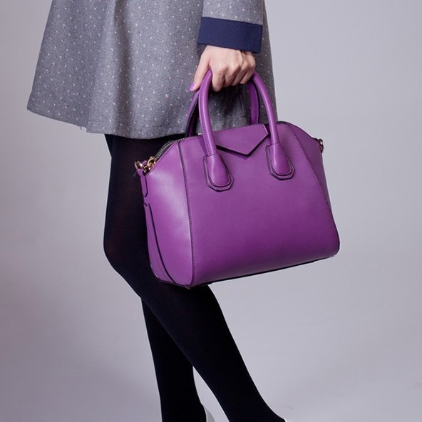 The Korean lady with a one-shoulder slant across the handbag with a new retro-tide-show bag for girls.