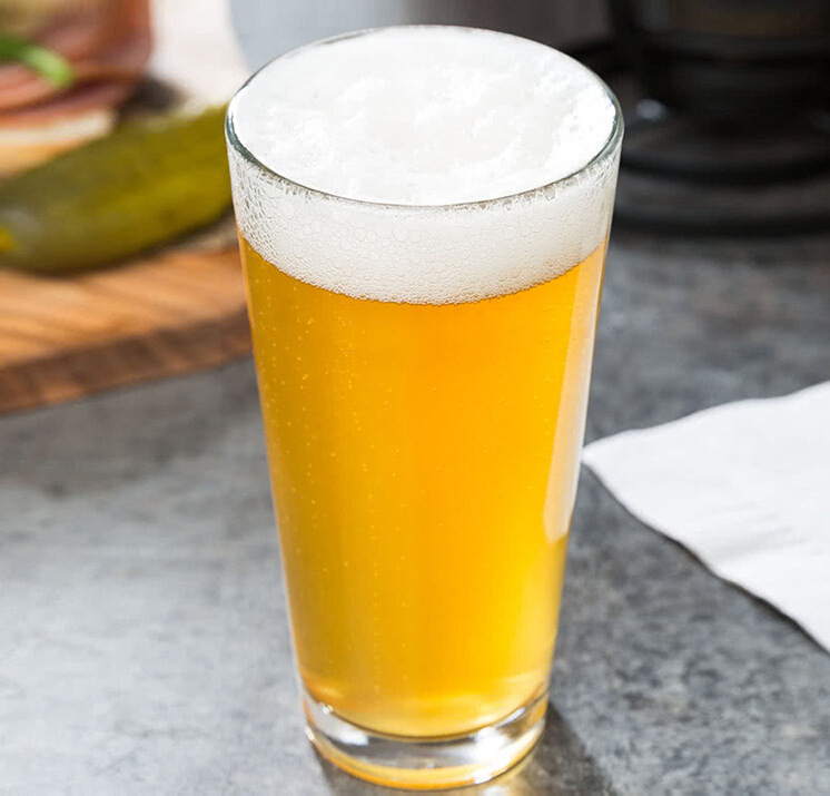 A glass with a glass and a glass with a glass with a pint of wine.