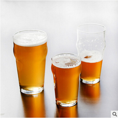 A glass with a glass and a glass with a glass with a pint of wine.
