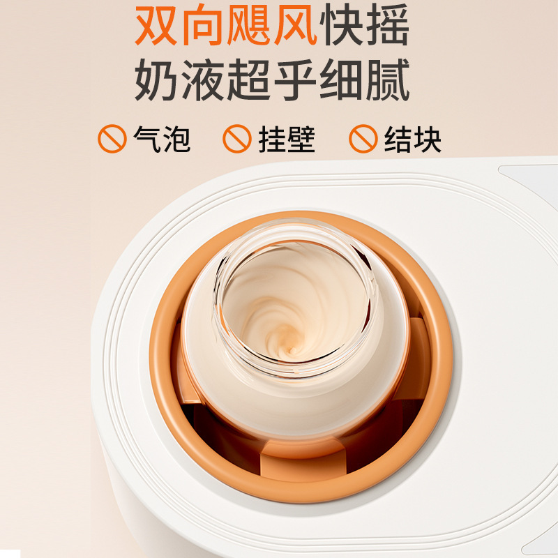 Máy lắc sữa gấu lớn là hai rưỡi máy tự động hòa bột nóng để giữ ấm đứa bé.