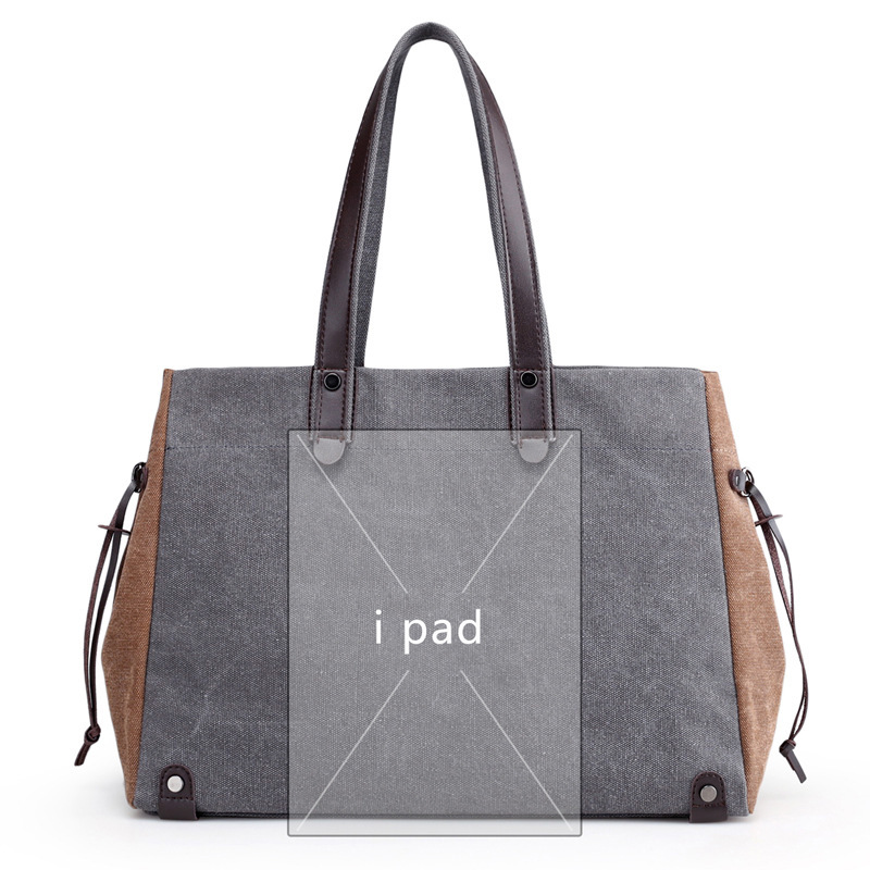 The woman in the canvas bag, one shoulder to one, with a new bag, with a large spare capacity.