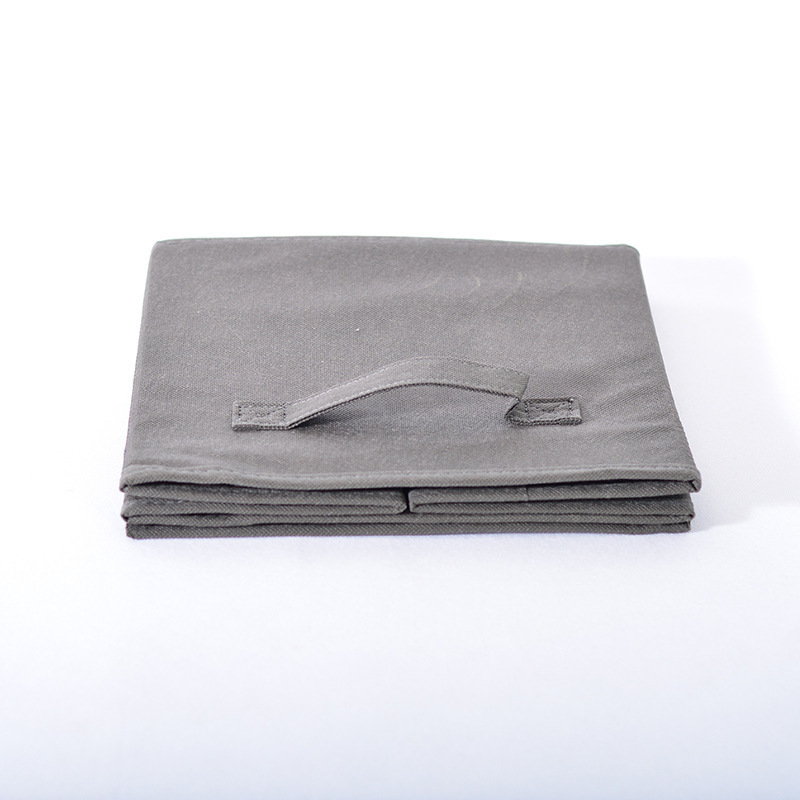A portable box of squares is accepted in a non-swipe folder drawer.