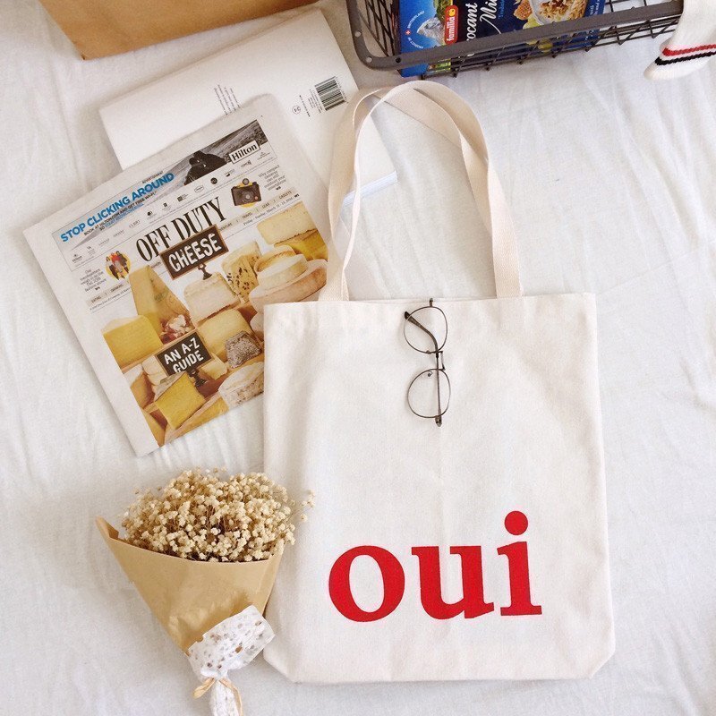 Korean-language oui-letter cotton-shopping bag, handheld cotton bags, cash, white logo one-shoulder rags.