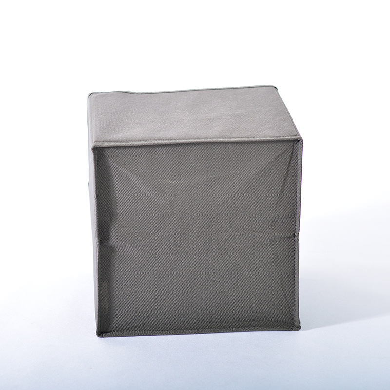 A portable box of squares is accepted in a non-swipe folder drawer.