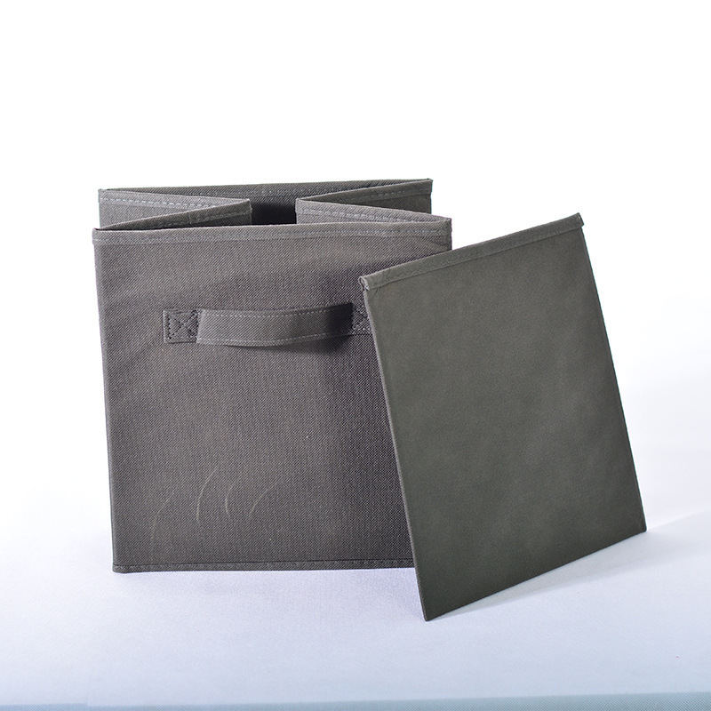 A portable box of squares is accepted in a non-swipe folder drawer.