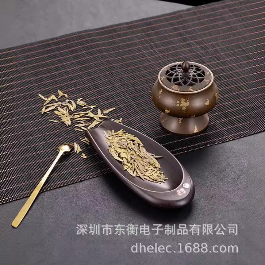 Trà điện tử có trọng lượng lớn trong nhà bếp, được gọi là gramst of the k qui đo trà.