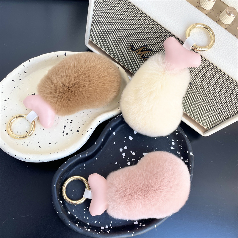 Fancy little twits, little chicken-legged car key buttons on a velvet doll bag for birthdays.