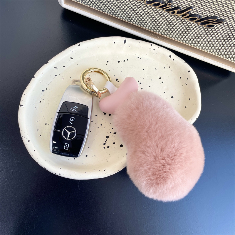Fancy little twits, little chicken-legged car key buttons on a velvet doll bag for birthdays.