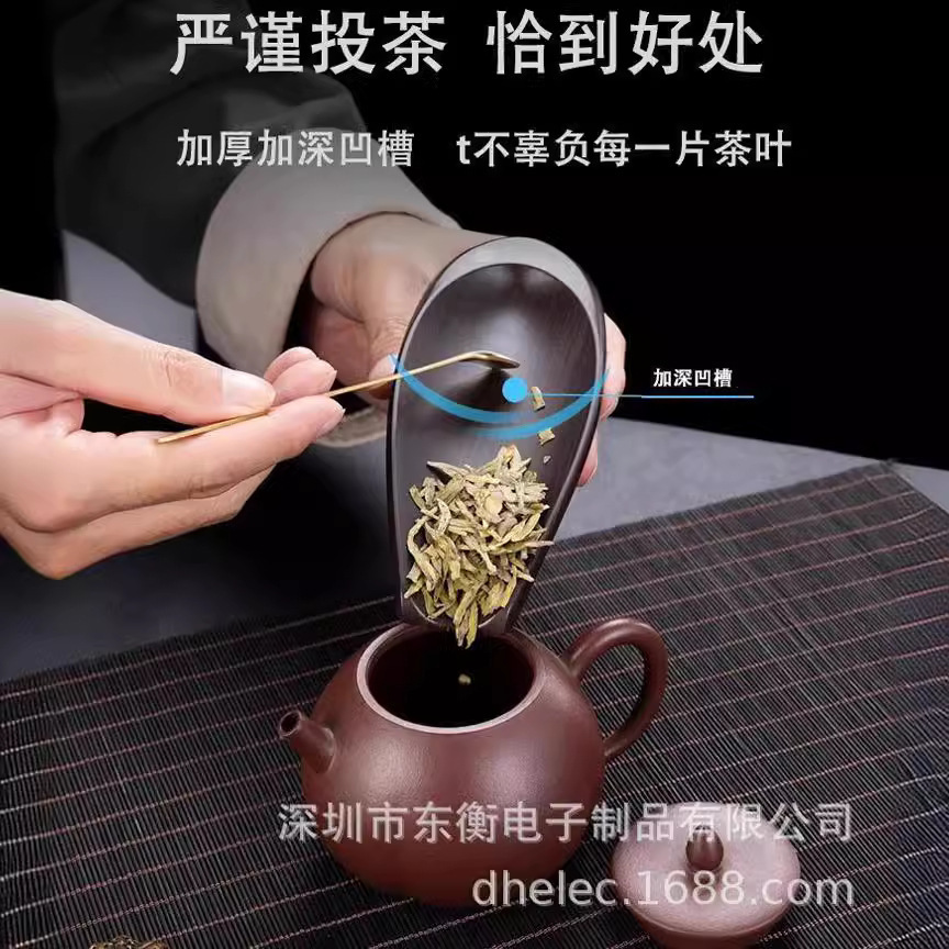Trà điện tử có trọng lượng lớn trong nhà bếp, được gọi là gramst of the k qui đo trà.