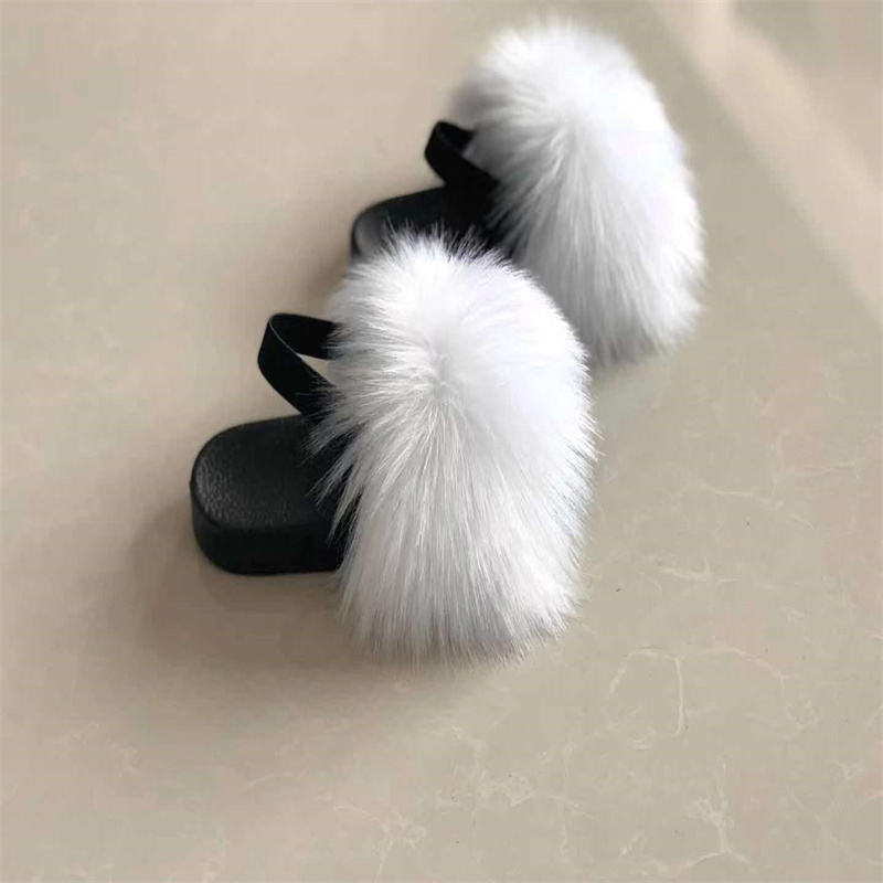 A hairy kid's shoelace i.e. a fury fox's fur furry furry sandals towed home-grown child shoes.