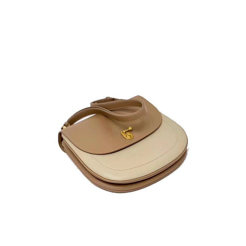 The women's bag process customised OEM 2023 new replicated leather-skin slashed tweeds, half-round saddles.