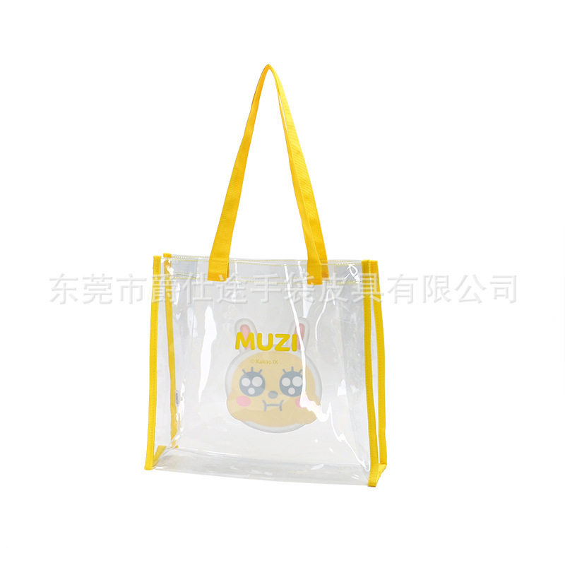 New cartoon PVC handbag, cute green PVC pack, large capacity PVC slash pack.