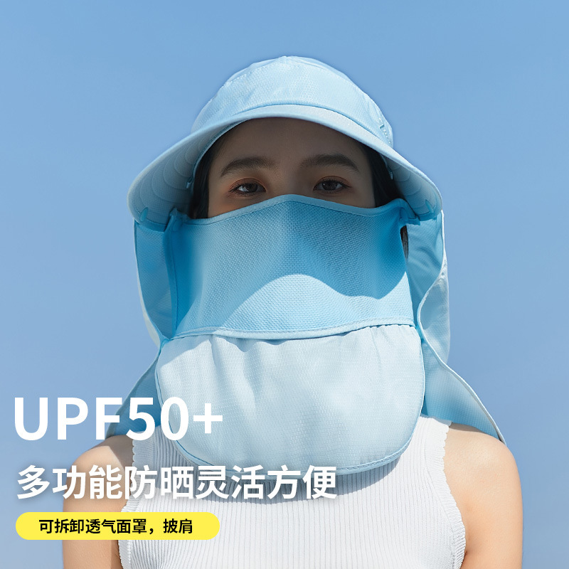 The suncap girl works outside the UV suncap to cover the sunscreen hood.