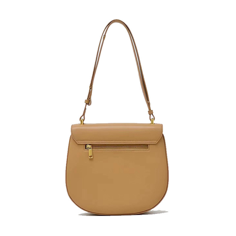 The women's bag process customised OEM 2023 new replicated leather-skin slashed tweeds, half-round saddles.