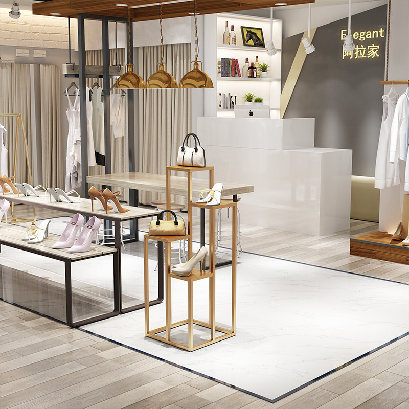 Clothes store designs a high-lower and modern exhibition stand to show the distribution of the package shelf flow table.