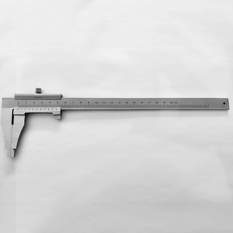 A student's track card is stainless steel, an industrial ruler, a tool to measure small scales.