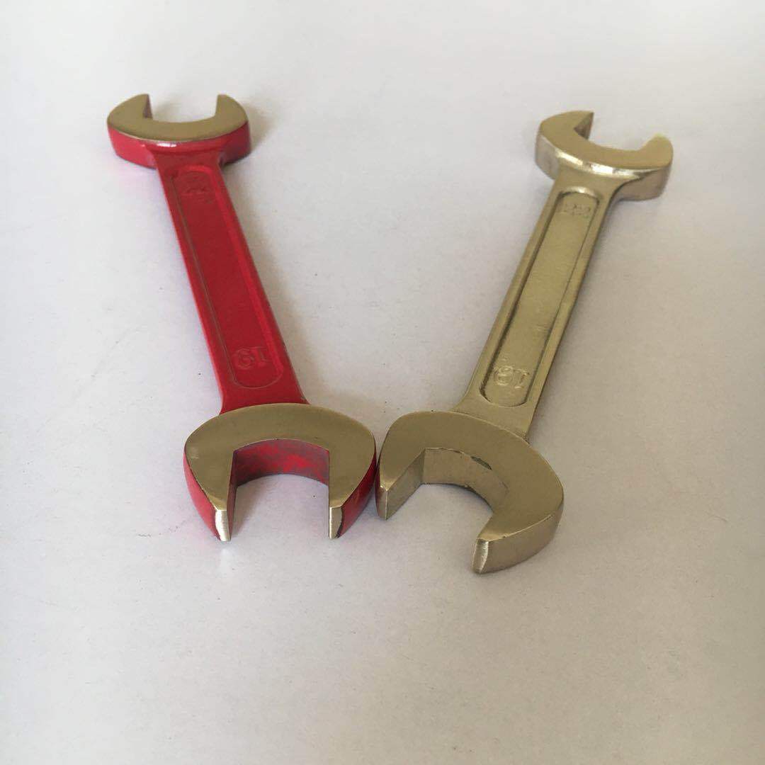 Worker's double-headed, dumb wrench.