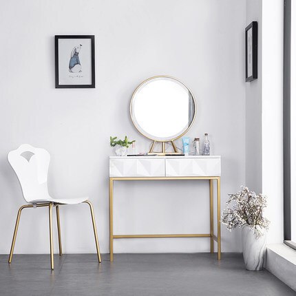 A modern, gold-colored dresser for Northern Europe.