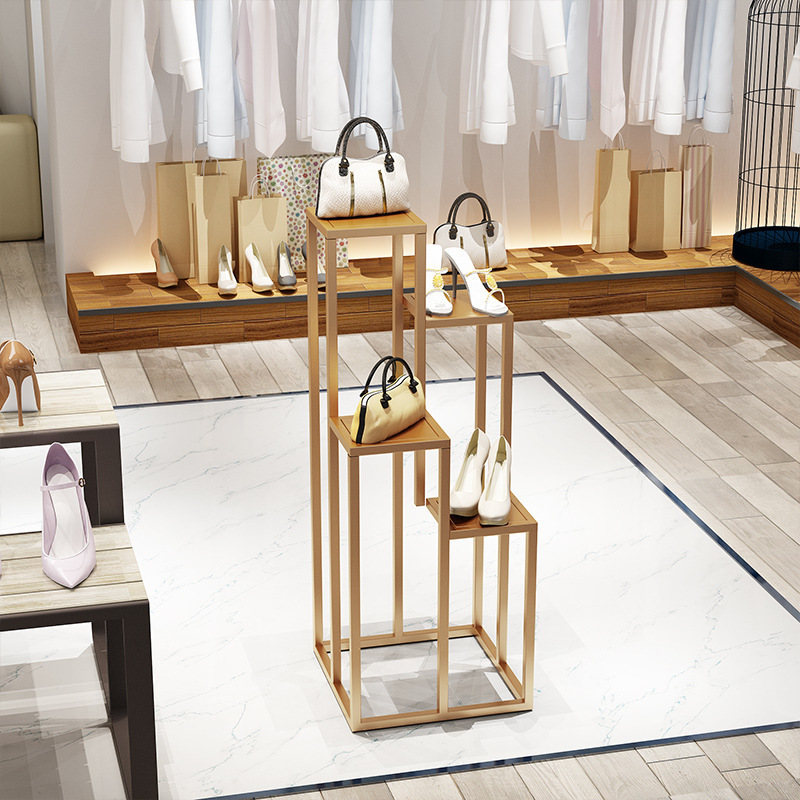 Clothes store designs a high-lower and modern exhibition stand to show the distribution of the package shelf flow table.