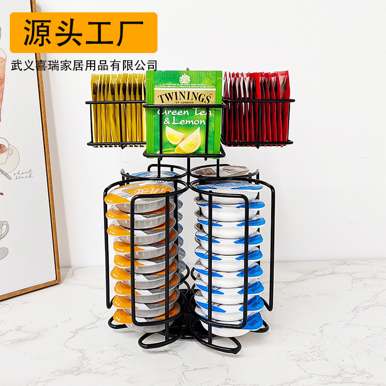 Sherry, túi trà hai tầng cho thấy một hộp cà phê Tassimo với một cái kệ xoay.