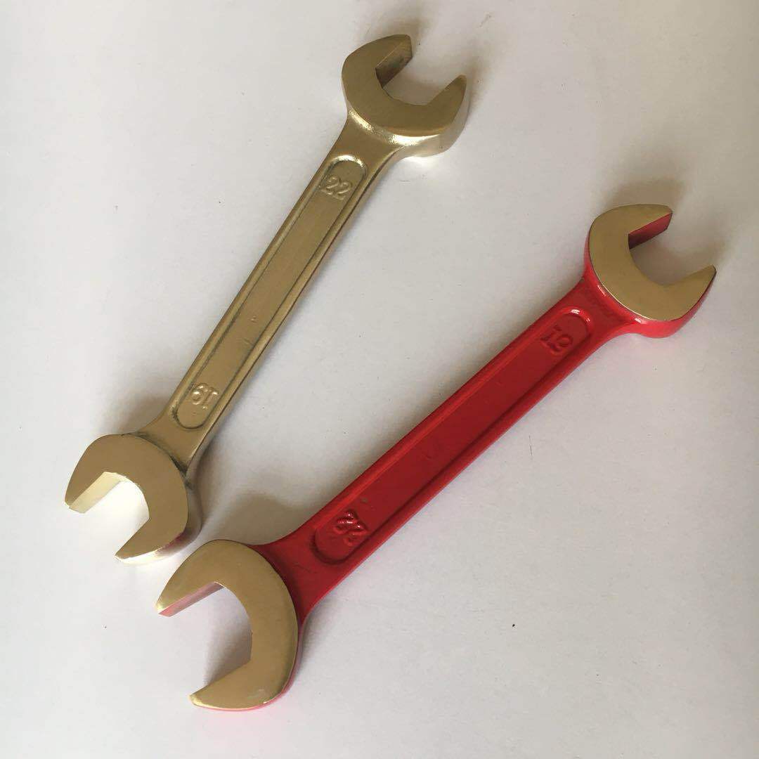 Worker's double-headed, dumb wrench.