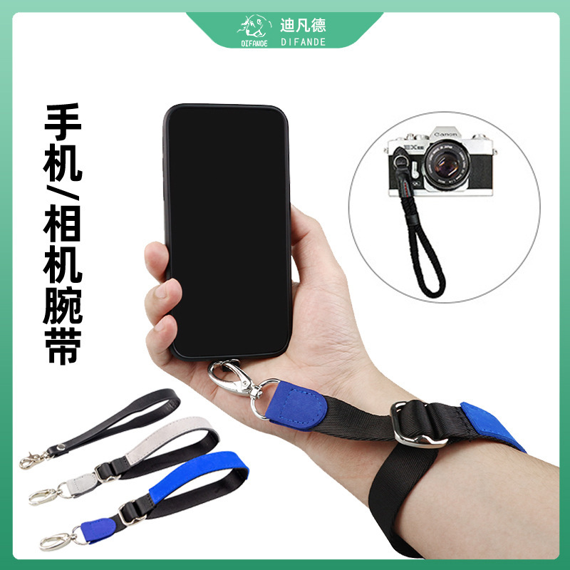 A single back camera with a common leather wristband, a mobile phone camera with a fall-proof camera with a digital micro-one handline.