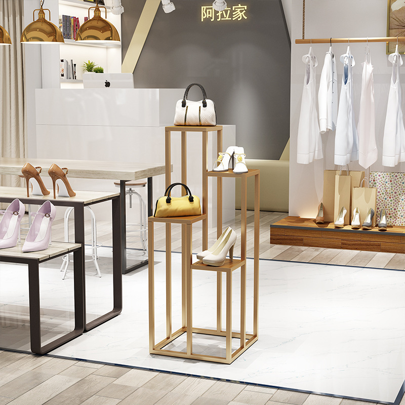 Clothes store designs a high-lower and modern exhibition stand to show the distribution of the package shelf flow table.