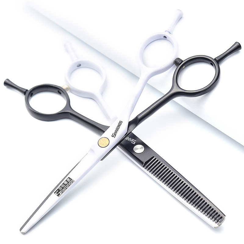 A hairdresser with a six-inch hairdresser set and a thin tooth cutter.