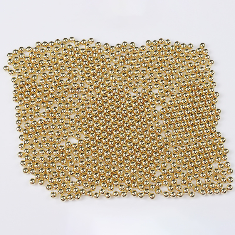 0.6 mm brass beads.