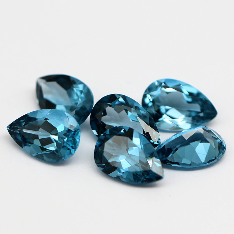 Nhà máy bán chiếc nhẫn Blue Crystal Blue Crystal topa Divine Pear, tinh khiết và không béo K-Gold.