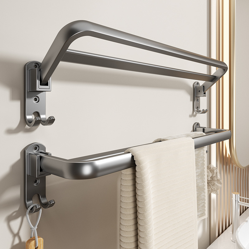 Các cột bồn cầu gấp lại mà không có lỗ trong khăn tắm cho một cái nắp gấp đôi không gian trong phòng tắm.