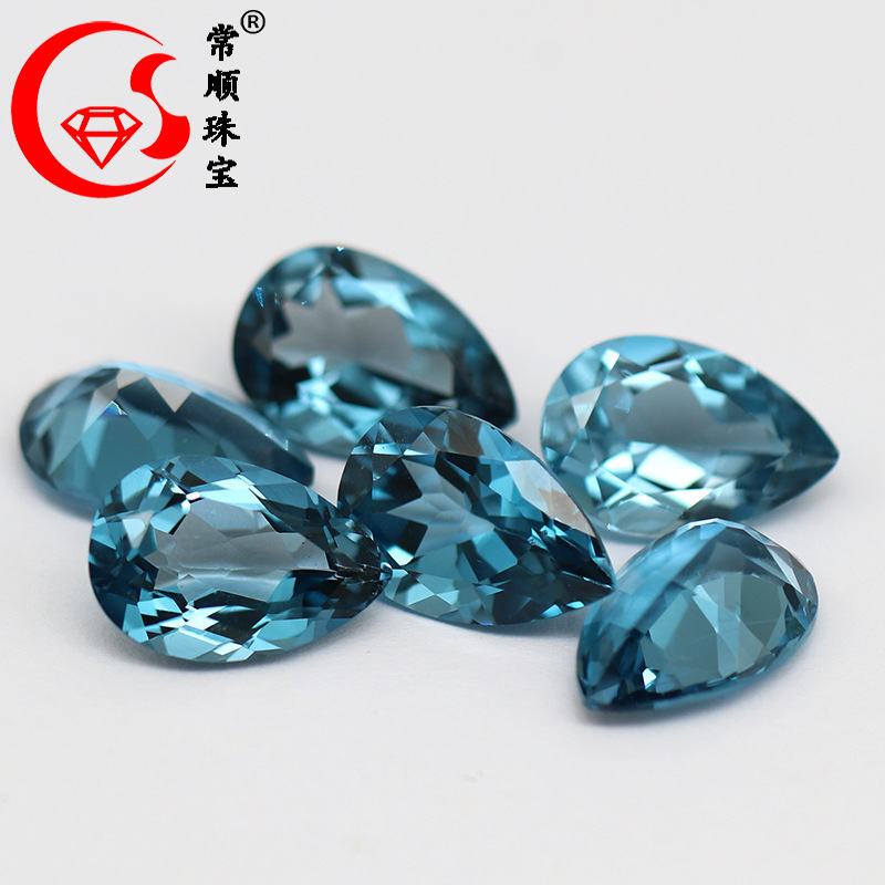 Nhà máy bán chiếc nhẫn Blue Crystal Blue Crystal topa Divine Pear, tinh khiết và không béo K-Gold.