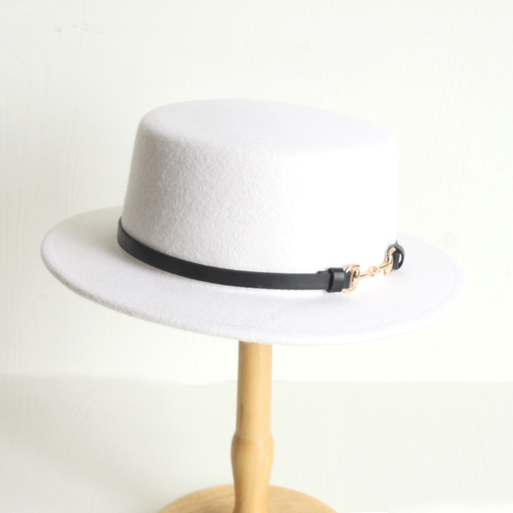 The white French flat hat, the old English hat, with wool.