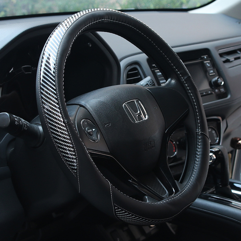 In a spot-car steering wheel, a general protection kit for sweat-smoking carbon-fibre leather is used.