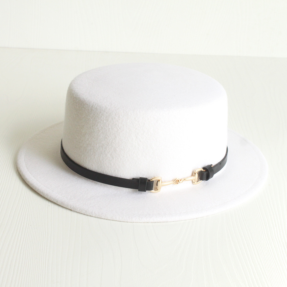 The white French flat hat, the old English hat, with wool.