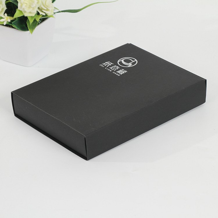 The silver-and-black-fashion box will be made of a drawer-type black card card box customised with creative folding of gift packs.