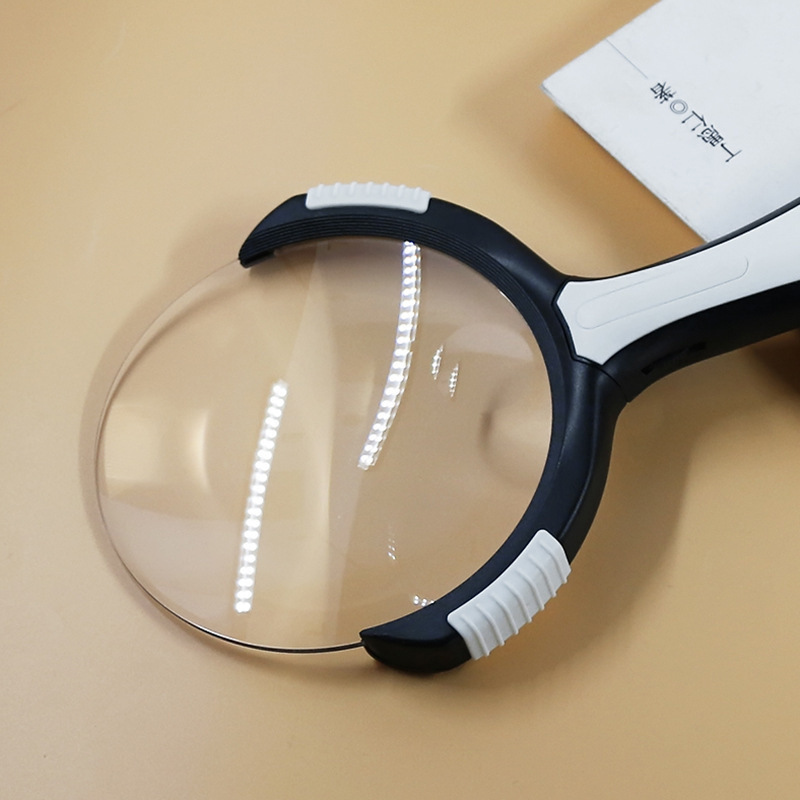 LED lens lights, ABS Wrestler holding magnifiers, reading, magnifiers, big size.