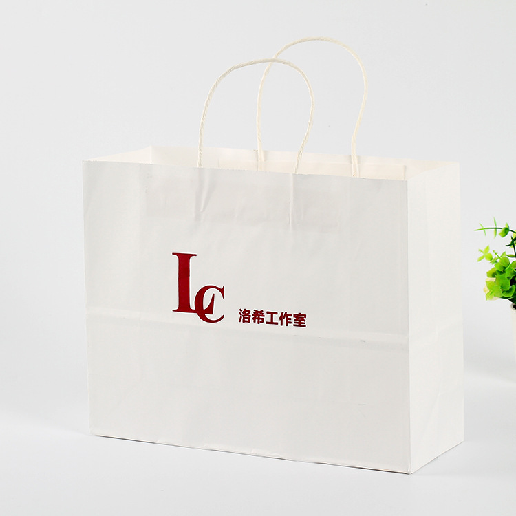 Advertising factory companies to make paper bags for hand-held white cow paper bags to customize shopping with gift bags