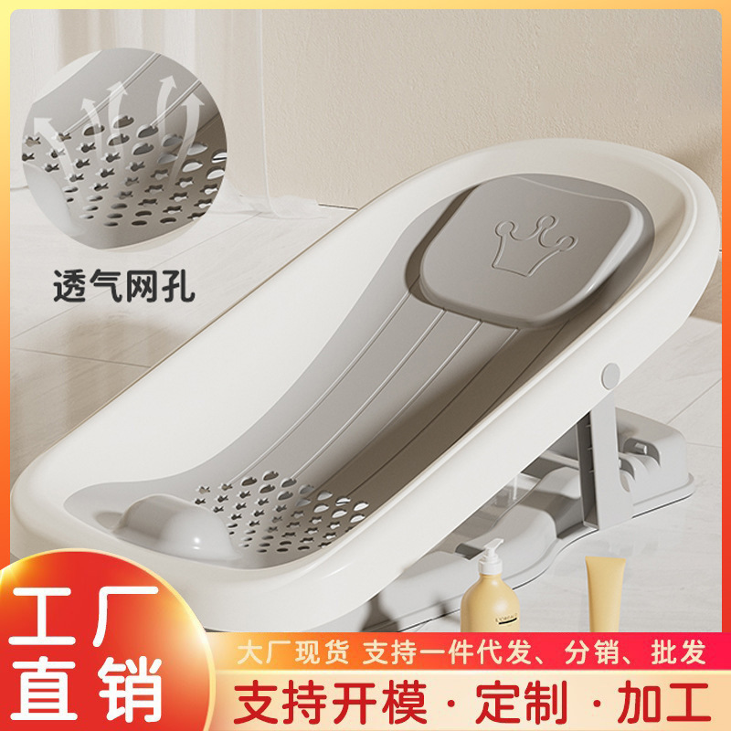 Thiết bị tắm của đứa bé có thể nằm trên giường tắm của đứa bé và lưới với ghế tắm của đứa bé.