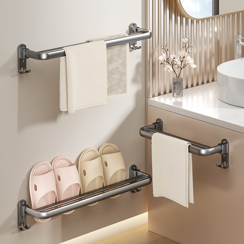 Các cột bồn cầu gấp lại mà không có lỗ trong khăn tắm cho một cái nắp gấp đôi không gian trong phòng tắm.